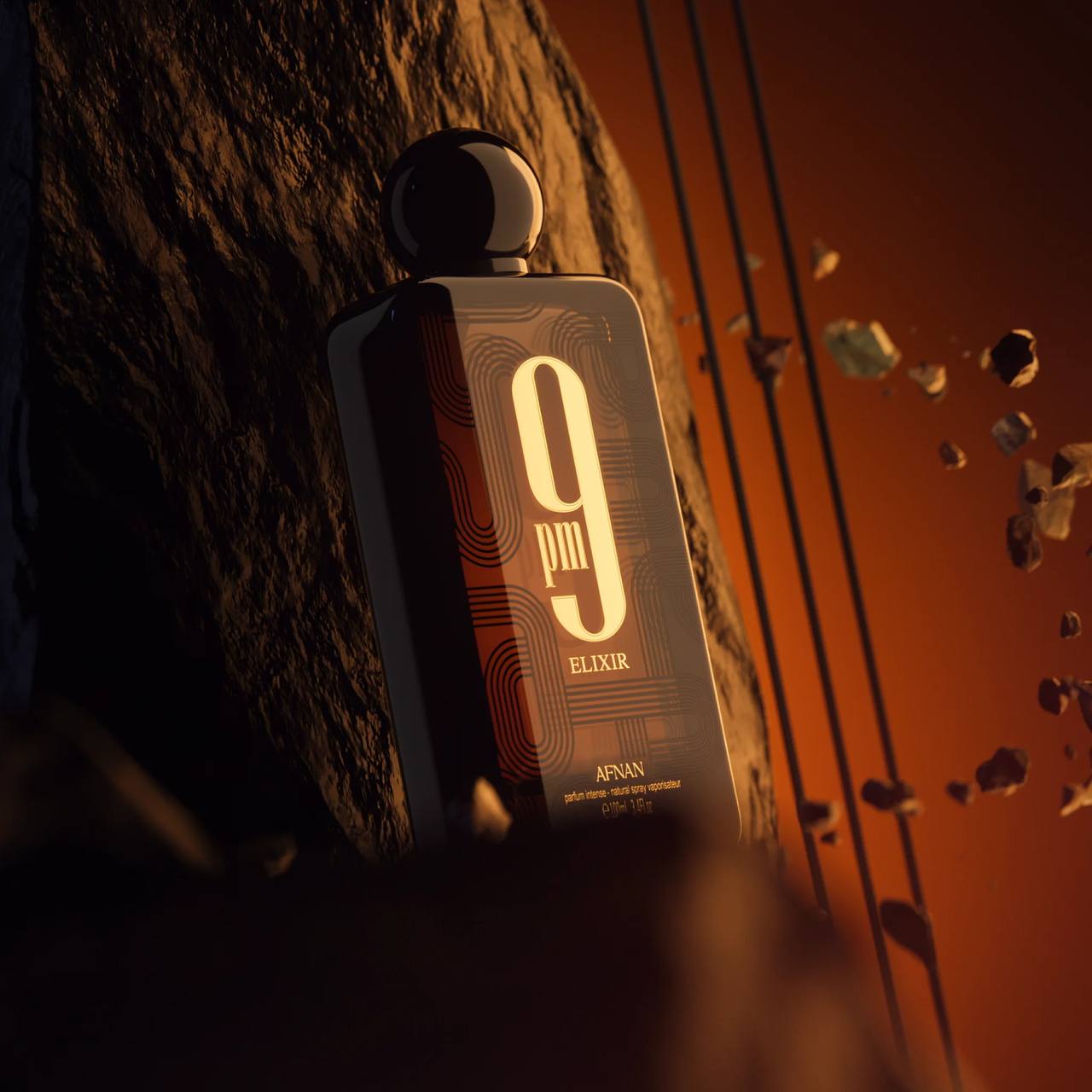Afnan 9PM Elixir (3.4 oz) — amber-spicy unisex fragrance with cardamom, leather, vanilla, and labdanum. Long-lasting; perfect for evening wear.