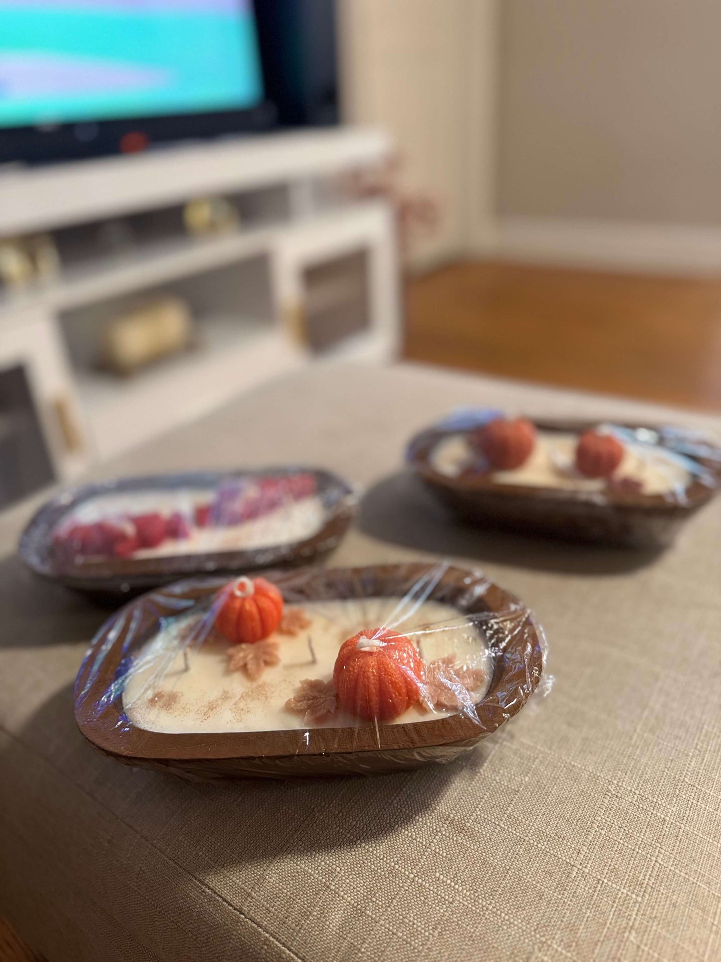 Handmade dough bowl candle — multi-wick, natural wooden bowl with pumpkin & leaves (or red floral) wax embeds