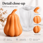 White 3D pumpkin silicone candle mold with finished orange gourd example