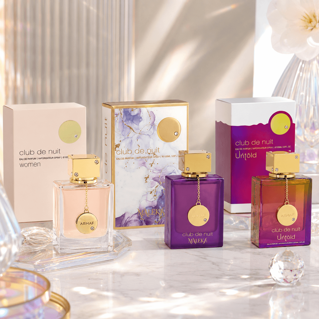 Armaf Club de Nuit Woman, Maleka and Untold three-piece Eau de Parfum bundle with bottles and boxes