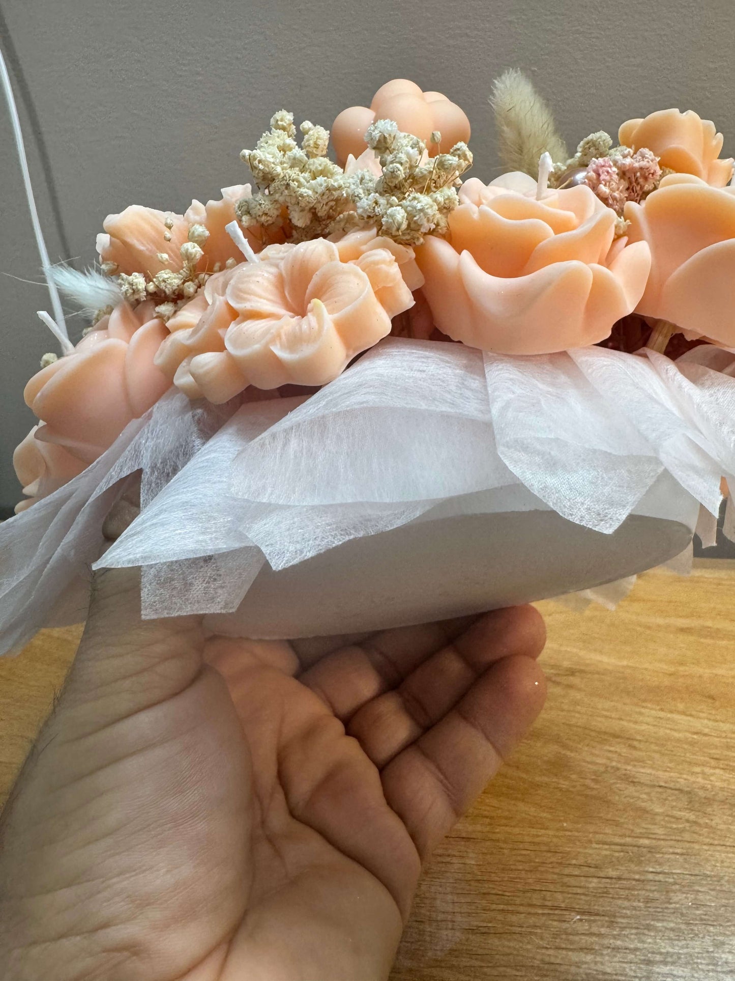 Handmade peach floral candle bouquet with teddy bear detail in ceramic base