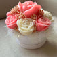 Solandra Eternal Bloom handmade floral candle centerpiece featuring handcrafted wax roses and decorative flower accents.