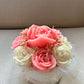Solandra Eternal Bloom handmade floral candle centerpiece featuring handcrafted wax roses and decorative flower accents.