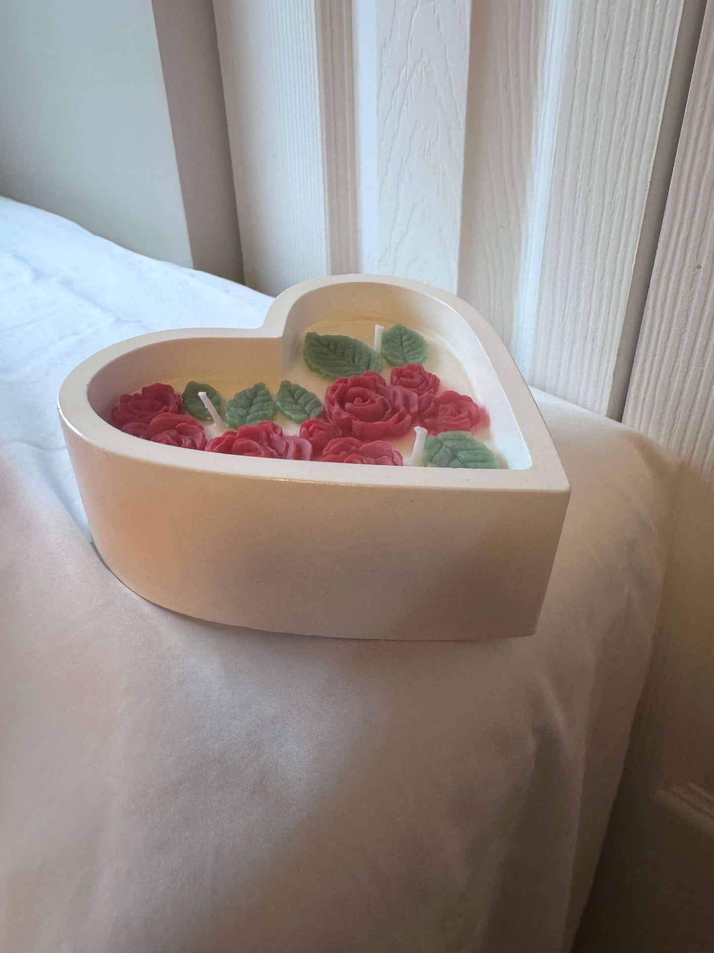 Heart-shaped decorative dough bowl candle with handmade wax details