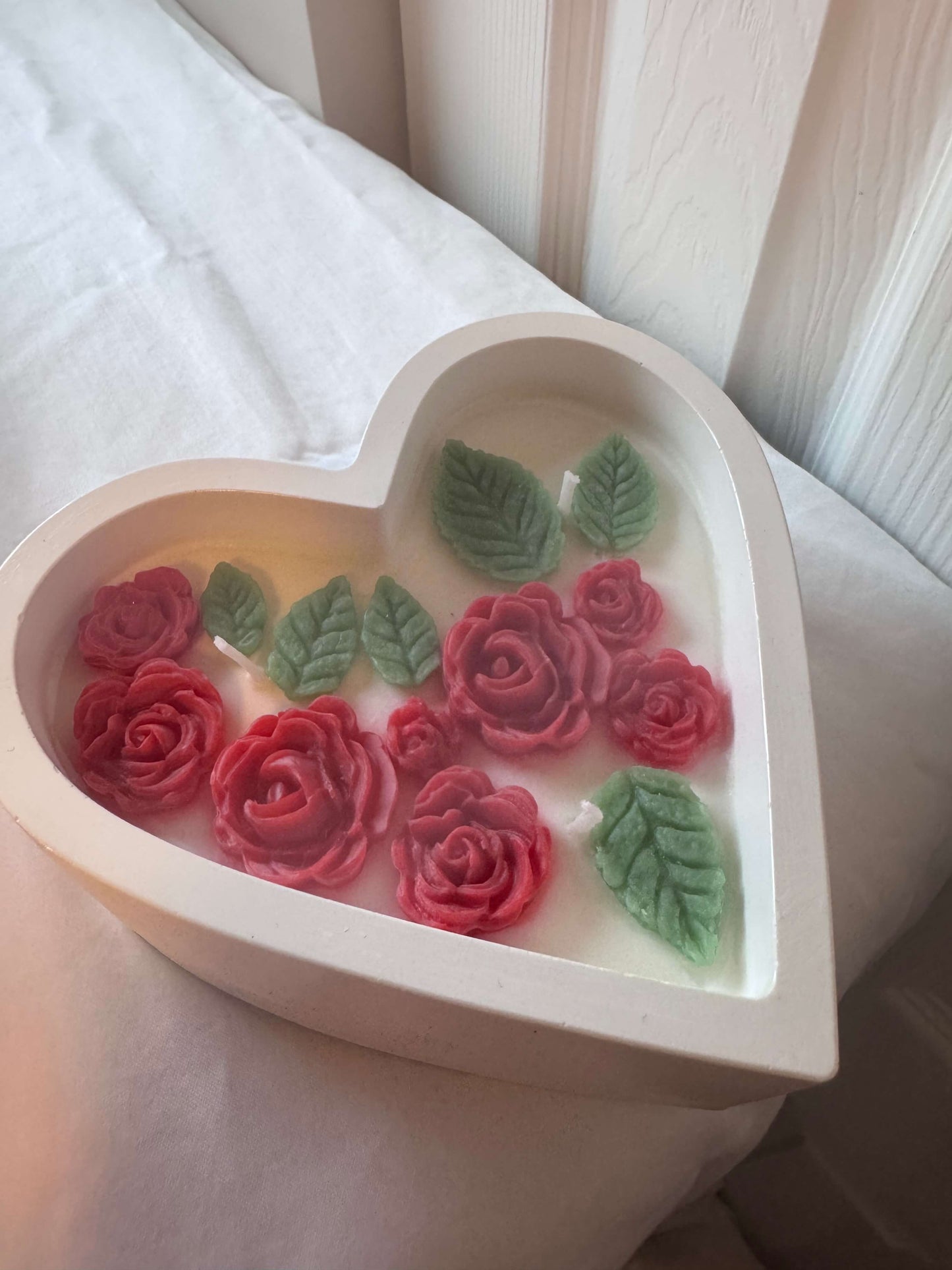 Heart-shaped decorative dough bowl candle with handmade wax details