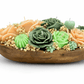 handmade floral soy candle centerpiece in rustic wooden bowl