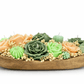 handmade floral soy candle centerpiece in rustic wooden bowl