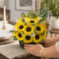 Handmade scented yellow sunflower candle bouquet with green foliage and plastic base