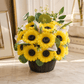 Handmade scented yellow sunflower candle bouquet with green foliage and plastic base