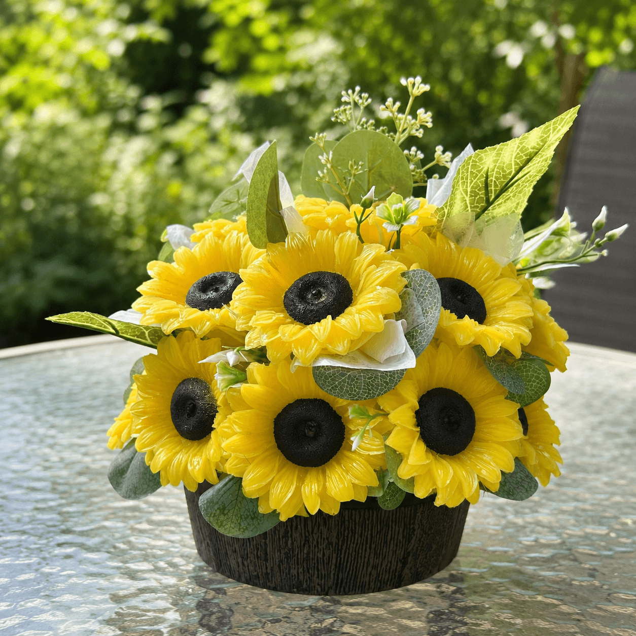 Handmade scented yellow sunflower candle bouquet with green foliage and plastic base