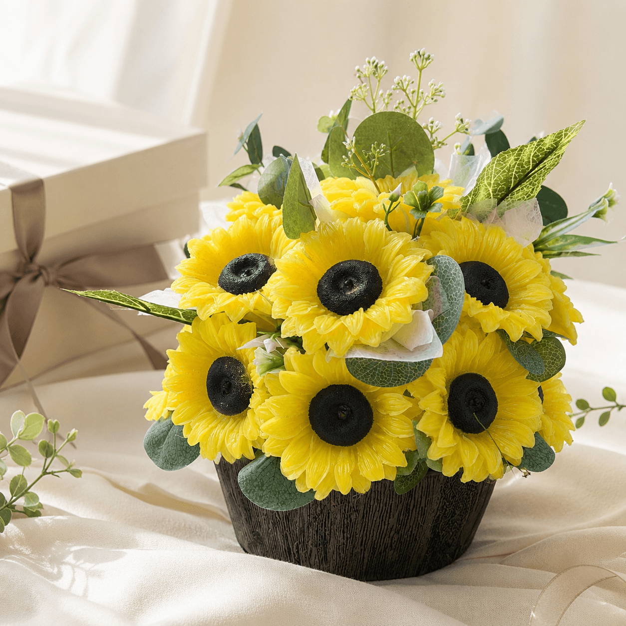 Handmade scented yellow sunflower candle bouquet with green foliage and plastic base