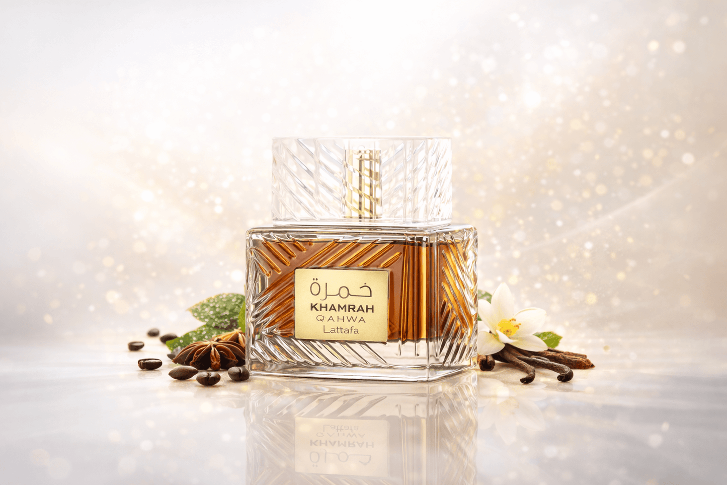 Khamrah Qahwa bottle with a cup of coffee and mint leaves on a marble surface.