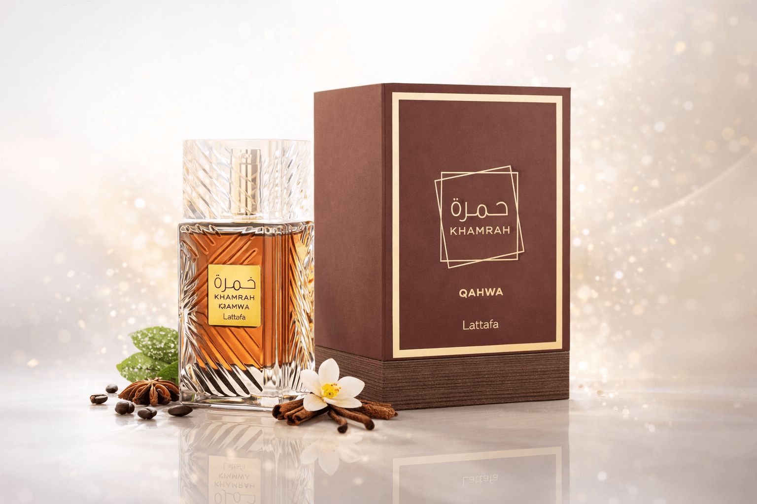 Khamrah Qahwa bottle with a cup of coffee and mint leaves on a marble surface.