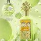 L’Haya Zesty Meringue Extrait de Parfum bottle with green luxury background