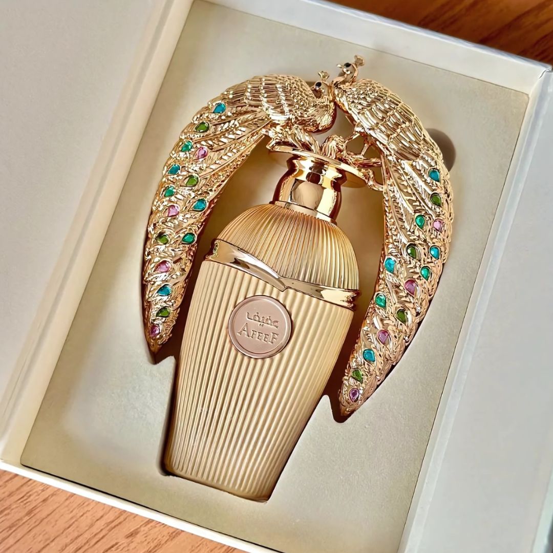 Shop Lattafa Afeef Eau de Parfum 100ml – a refined unisex fragrance with citrus, florals, woods, and musk. Long-lasting oriental luxury perfume.