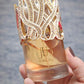 Lattafa Dalal Eau de Parfum 100ml (3.4oz) bottle with gold jeweled cap next to the Dalal retail box
