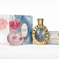 Lattafa fragrance bundle featuring Layaan, Victoria, and Musamam perfumes displayed on a clean white reflective surface