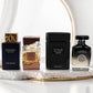 Luxury oud fragrance bundle with Shaghaf Oud Azraq, Ateeq, Shiyaaka Shadow and Absolute Noir perfumes on white background
