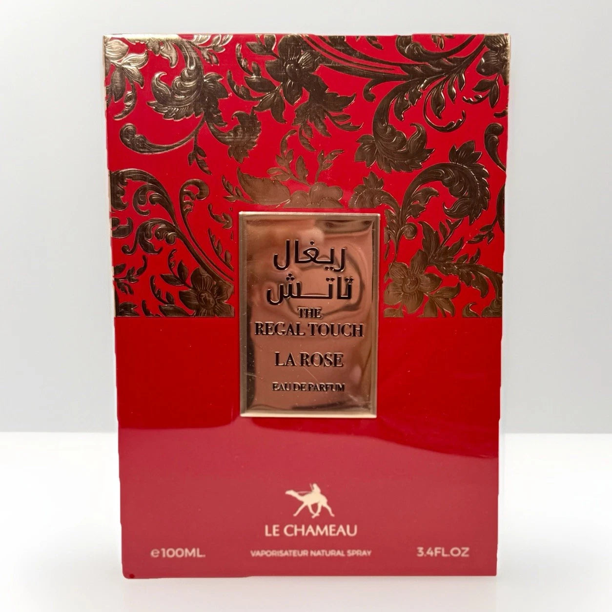 The Regal Touch La Rose Eau de Parfum 100ml by Le Chameau bottle and red box in white background