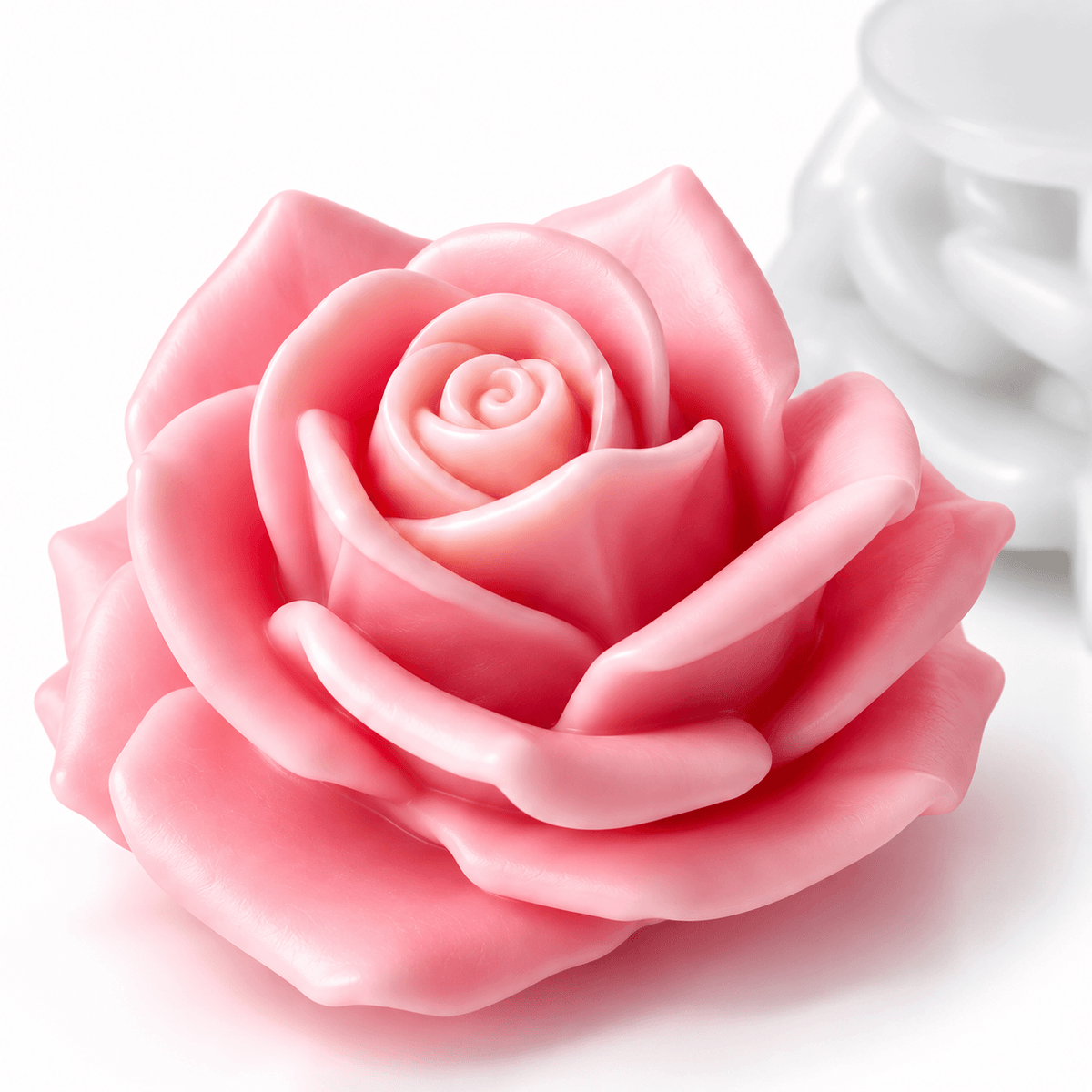 Large 3D rose silicone candle mold with raised support base and finished rose example