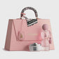 Pink handbag with 'Laverne' branding, including a perfume bottle and cream jar on a white background