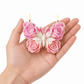 White FM2002 rose butterfly silicone candle mold with finished floral butterfly example