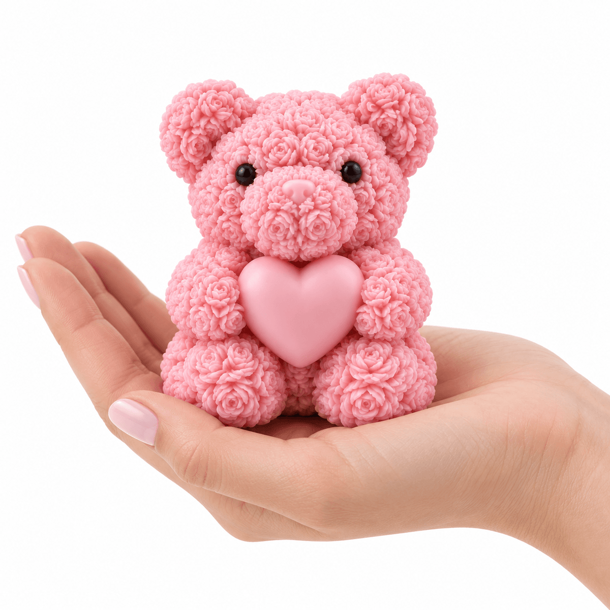 White teddy bear holding heart silicone candle mold with finished bear example