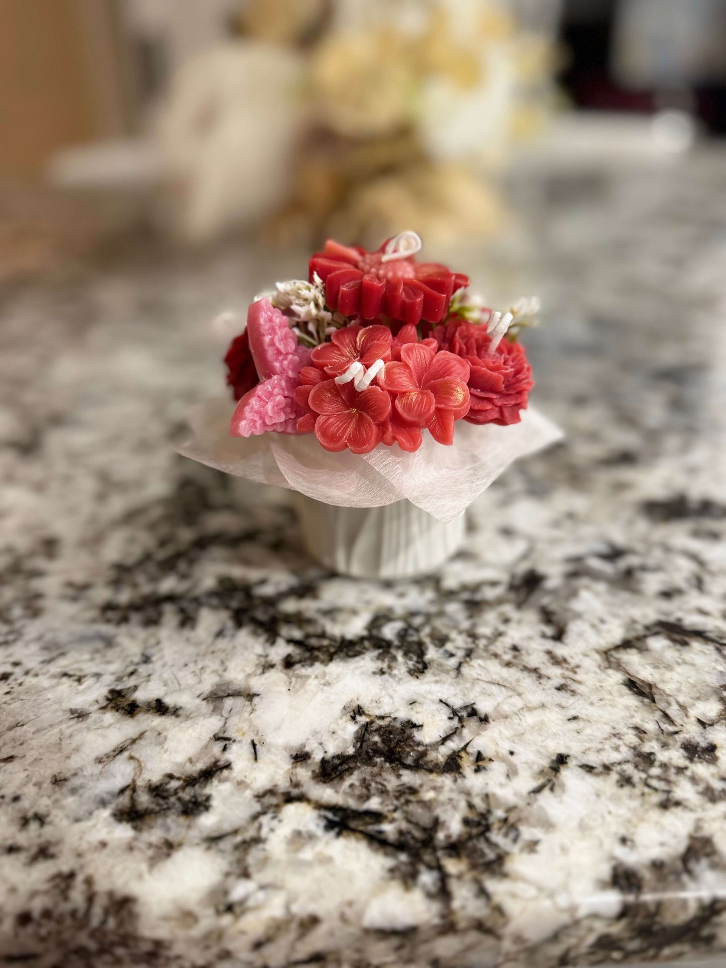 Premium handcrafted candle with fresh rose essence. Elegant floral design, perfect for gifting or luxury home décor.
