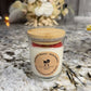 Discover Romantic Bloom – a premium rose essence candle with natural soy wax, bamboo lid, and elegant floral design. Long-lasting fragrance, perfect for gifts.