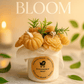 Handcrafted floral candle with tender baby powder essence. Elegant artisanal design, ideal for gifts or cozy luxury décor.